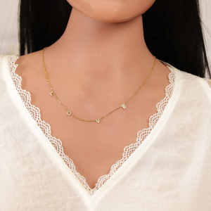 COLLIER ACIER DORÉ LOVE OXYDES BLANCS SERTIS 43+4CM