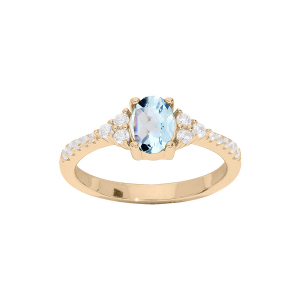 BAGUE PLAQUÉ OR TOPAZE BLEU ET OXYDES BLANCS SERTIS