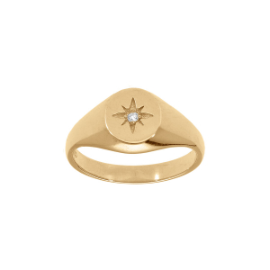 BAGUE PLAQUÉ OR FORME CHEVALIERE OVALE ETOILE OXYDE BLANC